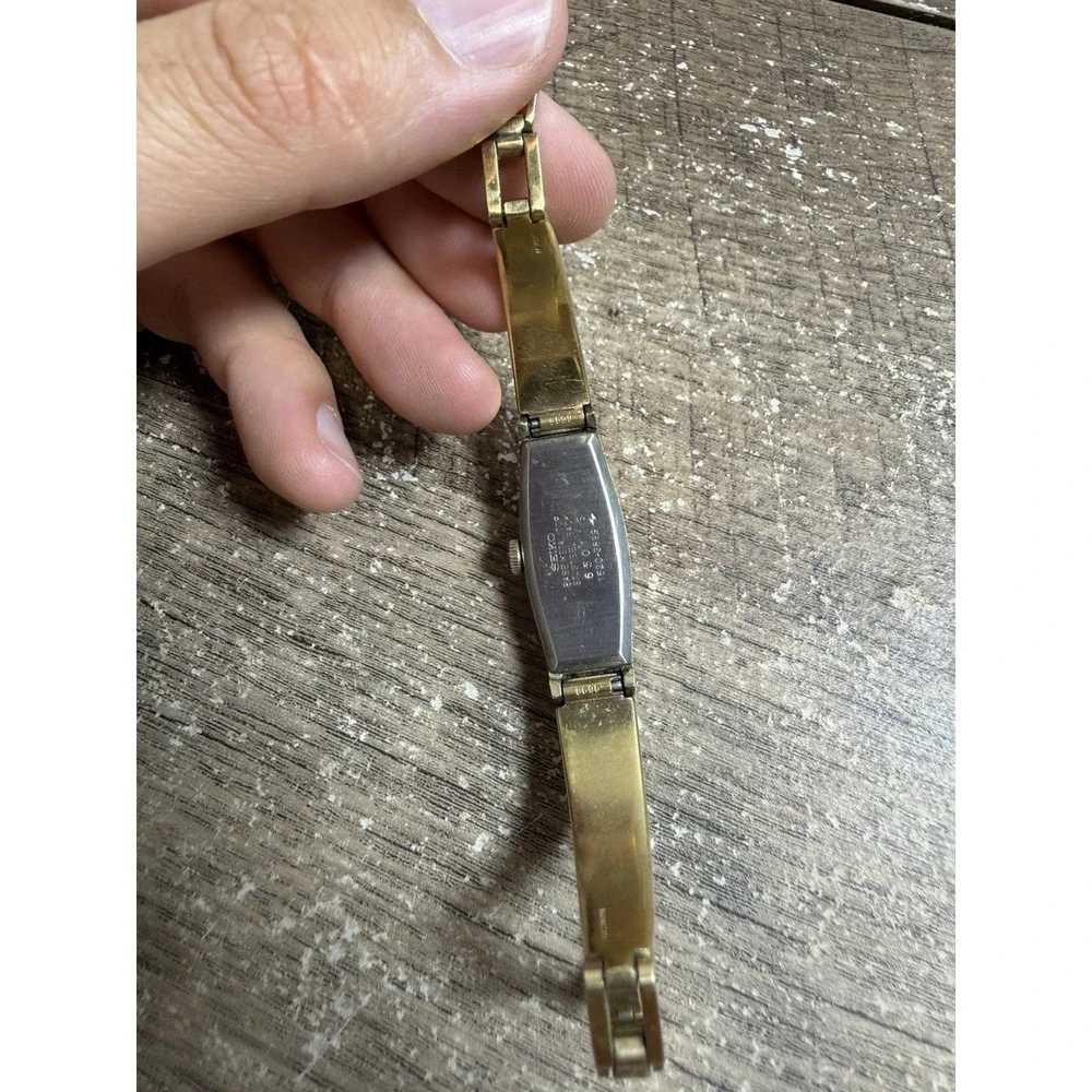 Vintage 80s Seiko Smokey Dial Dainty Gold Tone Cylinder Wind-Up Ladies